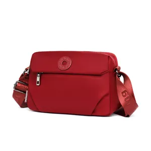 Casual women's nylon crossbody bag, stylish lightweight shoulder bag for daily shopping.