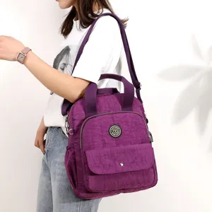 Mochila de nailon para mujer bolso bandolera informal elegante multifuncional con puerto USB