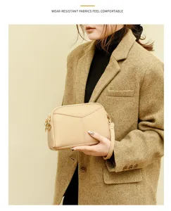 Elegant women PU leather shoulder bag with gold hardware, stylish minimalist daily clutch.