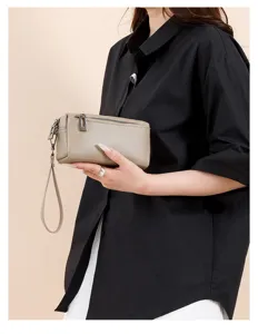Genuine leather women clutch phone bag wristlet wallet with multi zippers detail.