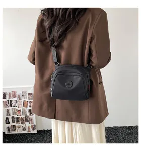 Lightweight nylon crossbody bag casual versatile single shoulder shell bag for women commute.