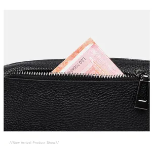 Black genuine leather women bag zipper detail texture close up high quality daily style