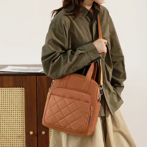 Stylish nylon quilted backpack and shoulder bag for women, casual daily wear and travel.