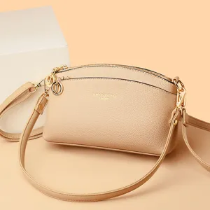 Stylish beige shell crossbody bag women large capacity commuter shoulder handbag with gold hardware