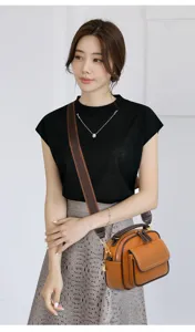 Detailed view of trendy multi-layer crossbody bag for women, stylish brown leather design.