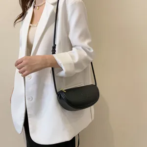 Stylish women's genuine leather shoulder crossbody bag, minimalist Korean fashion daily wear.
