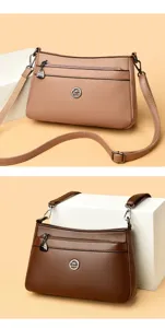 Detailed view of women's leather shoulder crossbody bag featuring fine metal hardware.