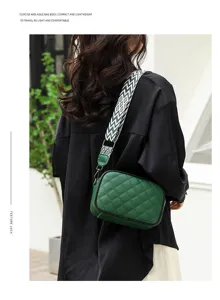 Genuine leather quilted crossbody bag for women, stylish camera bag with wide strap.