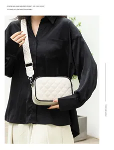 Minimalist white quilted leather crossbody bag with wide strap for women chic daily use.