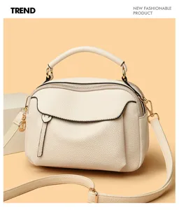 Stylish women soft leather crossbody handbag with top handle and multiple compartments.
