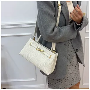 Elegant white woven shoulder bag with stylish metal clasp, perfect for daily wear and commuting.