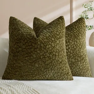 Green textured throw pillow cover detail shot showing soft chenille fabric and pattern.