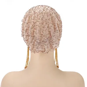 Detailed back view of the beaded mesh cap with elegant hanging tassel fringes for stylish looks.