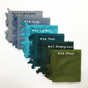 Solid color thin voile scarf with tassels, breathable women's shawl in multiple colors.
