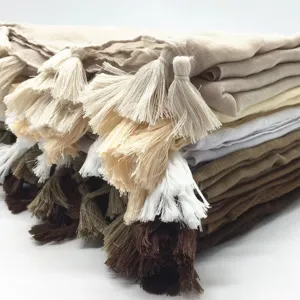 Solid color tassel voile scarf detail view, lightweight breathable fabric, elegant design.