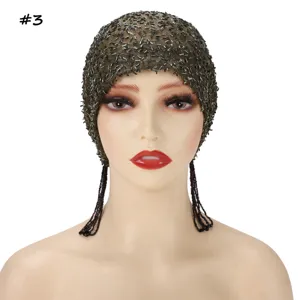 Close-up view of the beaded mesh cap detail, featuring sparkling sequins and elegant hanging tassels.