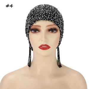 Black mesh beaded cap with tassels, detailed view of sequin embroidery and hanging bead chains.