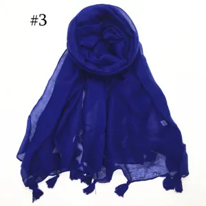 Royal blue lightweight voile scarf with delicate tassel fringe, elegant solid color design.