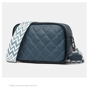 Blue quilted leather crossbody bag with wide geometric strap stylish casual camera shoulder bag