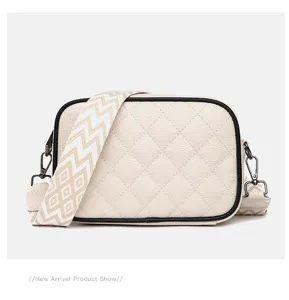 Elegant quilted leather crossbody bag for women, trendy chic shoulder bag with wide strap.