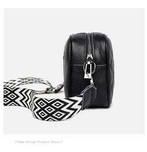 Black genuine leather quilted crossbody camera bag featuring a stylish geometric wide strap.