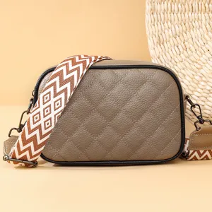 Quilted leather crossbody bag for women with wide geometric strap stylish daily shoulder bag