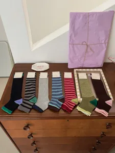 Korean style striped long socks for women, retro color block cotton casual hosiery.