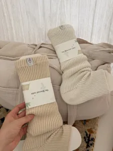 Soft merino wool thick leg warmers, cozy knitted slouch socks for winter daily wear.