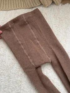 Warm winter knit ribbed tights for women, solid color woolen leggings, cozy and stretchy fit.