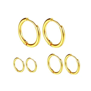 Set de boucles d'oreilles créoles en acier doré, design minimaliste pour femmes et hommes.