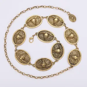 Cadena de cintura de metal dorado vintage con medallones de craneo de toro para vestidos.