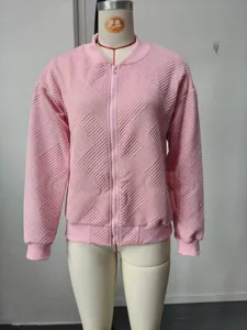Pink textured zip-up bomber jacket for women, stylish long sleeve casual outerwear.