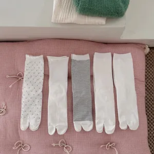 Comfortable cotton split-toe tabi socks set, polka dot and striped design for daily wear.