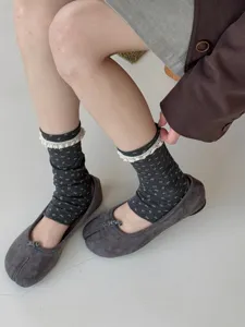 Cozy grey floral pattern women socks with delicate white lace ruffle trim detail view