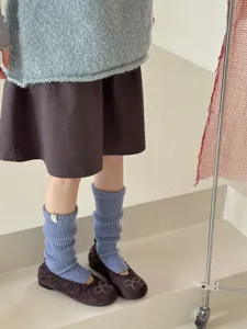 Wool slouch leg warmers for women, thick cozy winter knit socks in stylish grey-blue color.