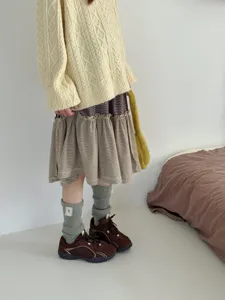Cozy grey knit slouch socks for women, perfect for Japanese ins style autumn and winter outfits.