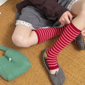 Red pink striped stirrup socks for women, vintage contrast color long socks for autumn style.
