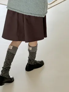 Korean style retro color block layered stirrup socks with cute dots and stripes detail.