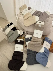 Detailed view of thick wool knit leg warmers in various colors for winter warmth and cozy styles.