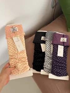 Korean style striped leg warmers stirrup socks for women, trendy contrast color knit detail.