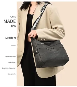 Women large capacity soft leather crossbody hobo bag with wide patterned strap for daily use
