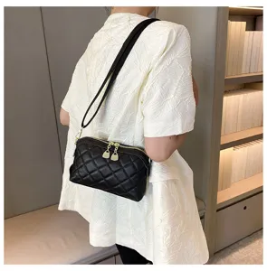 Fashion black quilted genuine leather shoulder crossbody bag for women casual daily use.