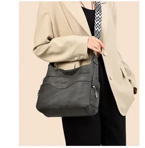 Soft leather multi-pocket shoulder bag for women, casual large capacity crossbody hobo bag.