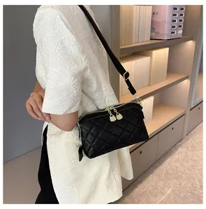 Black quilted leather shoulder bag for women, casual crossbody bag with metal zippers.