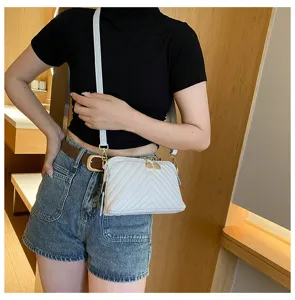 Casual genuine leather women shoulder crossbody bag showcasing chic V-quilted pattern.