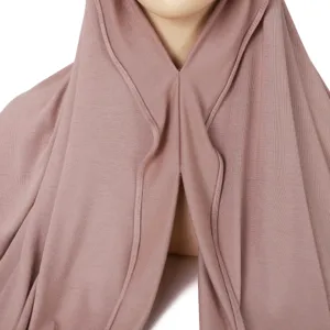Solid color rolled edge mercerized cotton hijab tubular cap, close-up knit fabric detail.