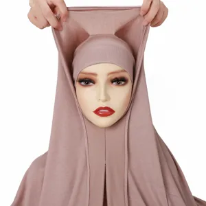Solid color cotton stretch hijab cap detail, showing breathable fabric and seamless design.