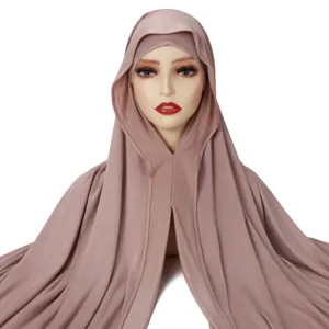 Detail view of solid color mercerized cotton integrated hijab pullover cap for women daily wear.