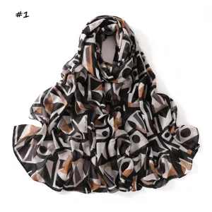 Geometric contrast color print long scarf, soft textured fabric detail view showcasing trendy style.