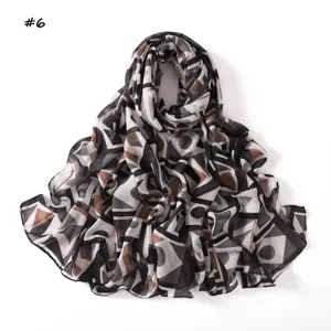 Detail view of the geometric color block scarf, soft slub cotton shawl, abstract print.